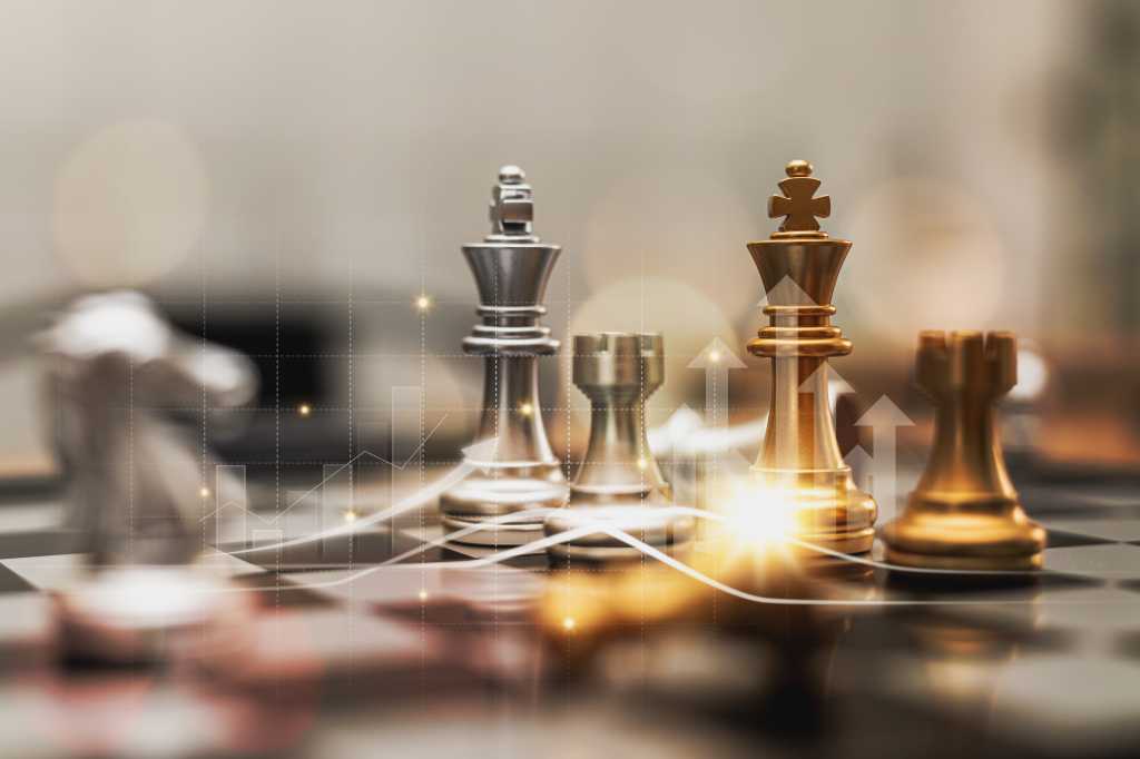 Close up of a chess board with chess pieces, business and technology concept.