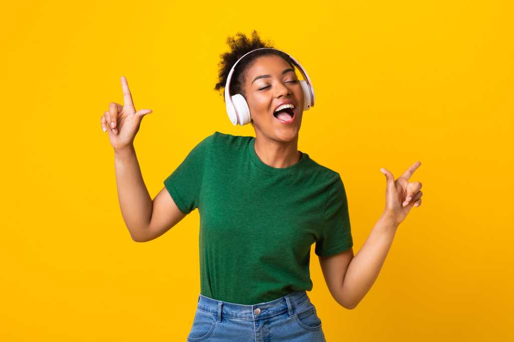 happy singing winning shutterstock 1761880700