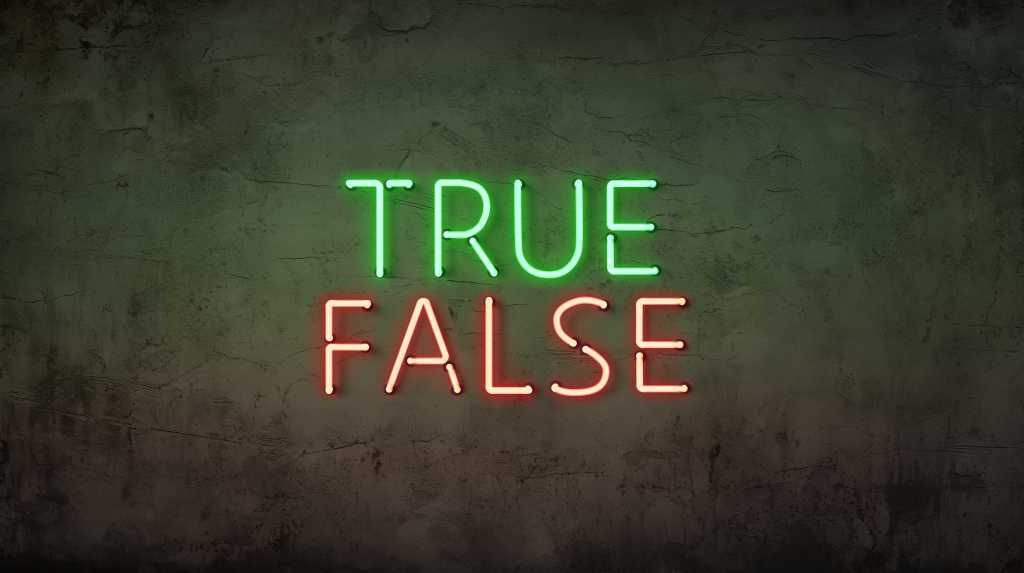 A neon sign with the word TRUE in green and the word FALSE in red on a grunge background.