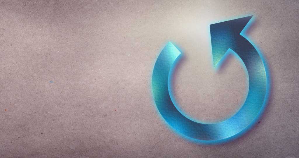 Neon blue 'reload' arrow on a textured background.